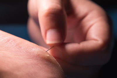 Close-up of person holding hands