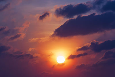 Low angle view of dramatic sky during sunset