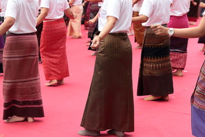 Low section of women standing on stage