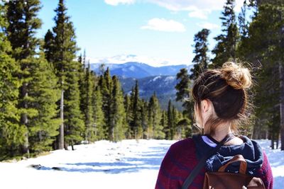 Woman standing on mountain