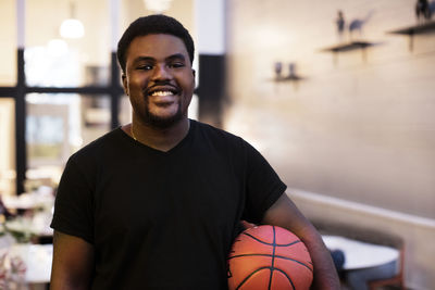 Portrait of smiling basketball player