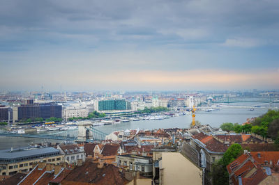 High angle view of city buildings against sky