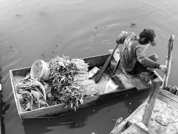 High angle view of men fishing in sea