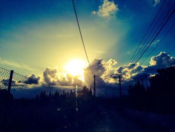 Electricity pylon at sunset