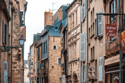 Low angle view of buildings against clear sky