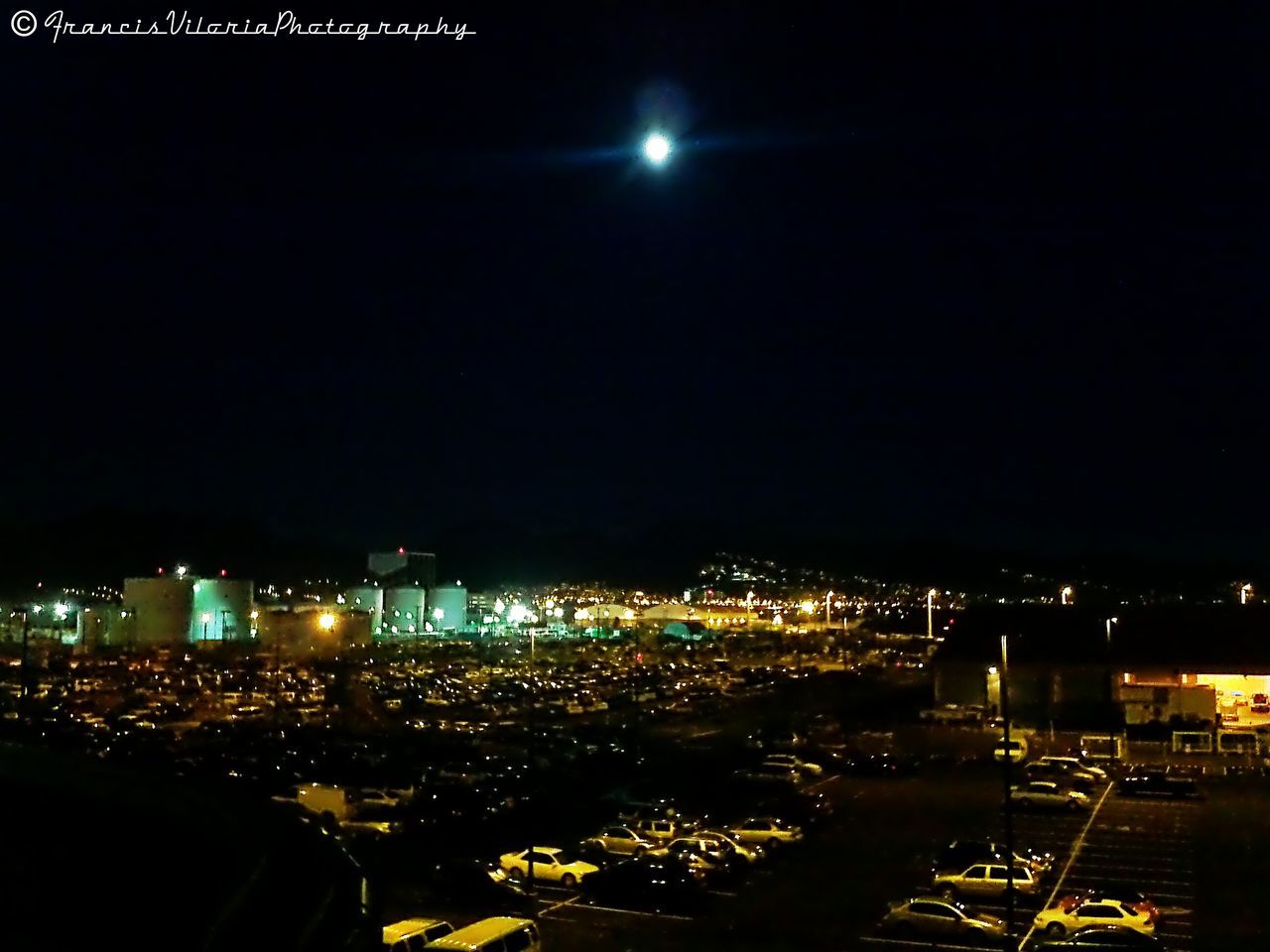 night, illuminated, city, building exterior, cityscape, architecture, built structure, lighting equipment, dark, moon, copy space, light - natural phenomenon, sky, clear sky, city life, high angle view, light, street light, glowing, outdoors