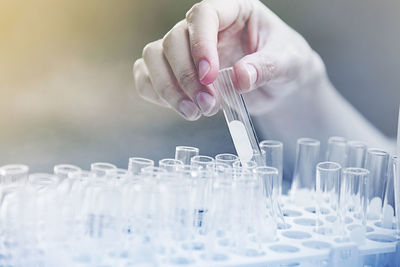 Cropped hand of scientist holding test tube