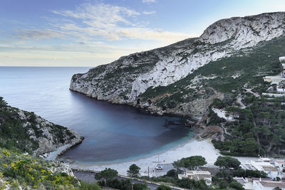 Scenic view of sea and rocks against sky