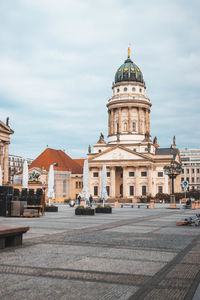 View of buildings in city against sky