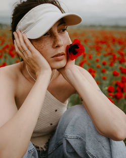 Portrait of young woman looking away
