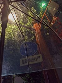 High angle view of text on glass window