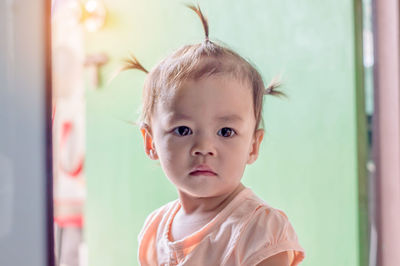 Portrait of cute boy at home