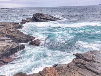 Scenic view of rocky beach