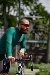 Young man exercising in park