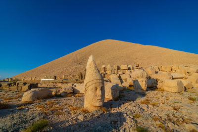 Statues on the western terrace of mount nemrut