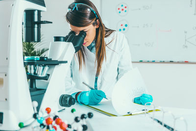 Young woman working in laboratory