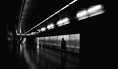 Silhouette of woman in background