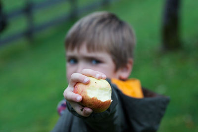 Close-up of man eating food