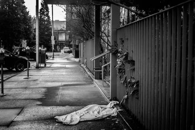 Man on sidewalk in city