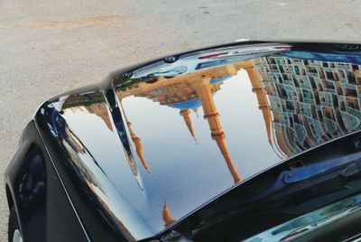 Reflection of car on side-view mirror