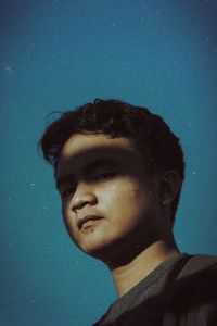 Portrait of young man in swimming pool