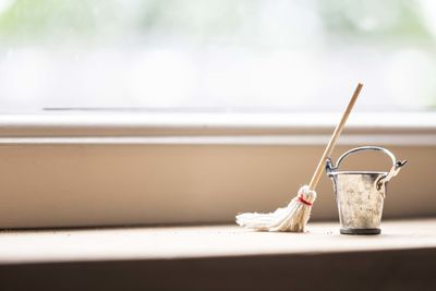 Close-up of paintbrushes in jar on table