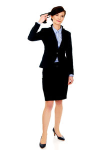 Full length of a woman standing against white background