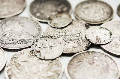 High angle view of coins