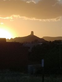 Building against sky during sunset