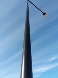 Low angle view of street light against sky