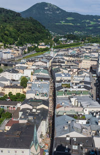 High angle view of townscape by road in city