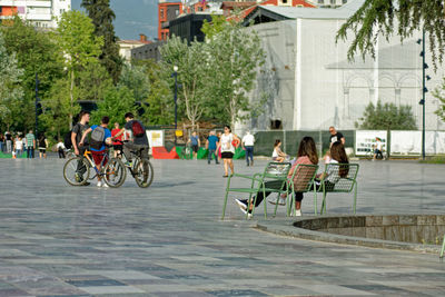 Group of people on bicycle in city