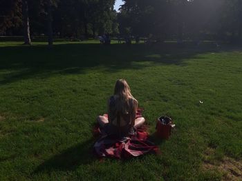 Women sitting on grass in park