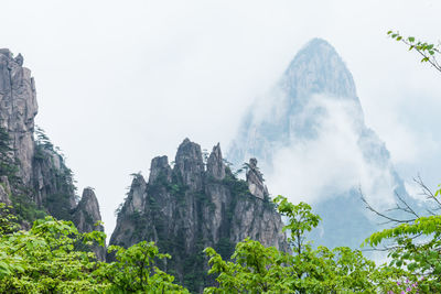 Panoramic view of rocky mountains against sky