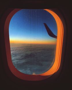 Scenic view of sky seen through airplane window