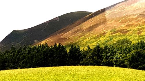 Scenic view of mountains against clear sky