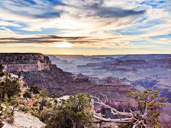 Scenic view of landscape against cloudy sky