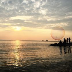 Scenic view of sunset over sea