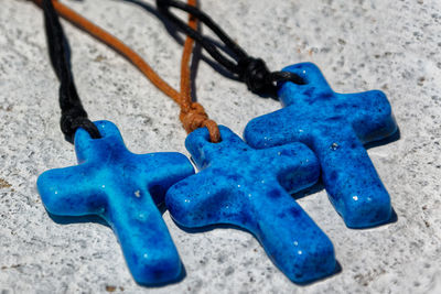 High angle view of blue metal container on sand