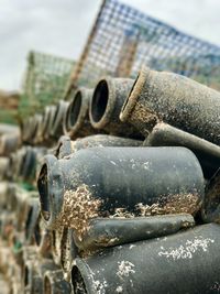 Close-up of rusty metal against sky