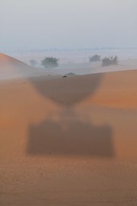 Scenic view of desert against sky