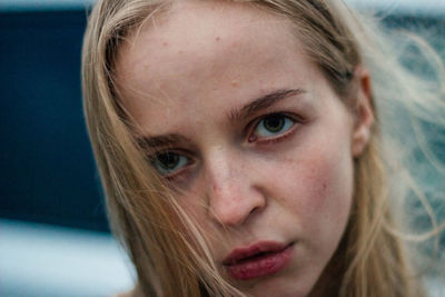 Close-up portrait of beautiful blonde woman 