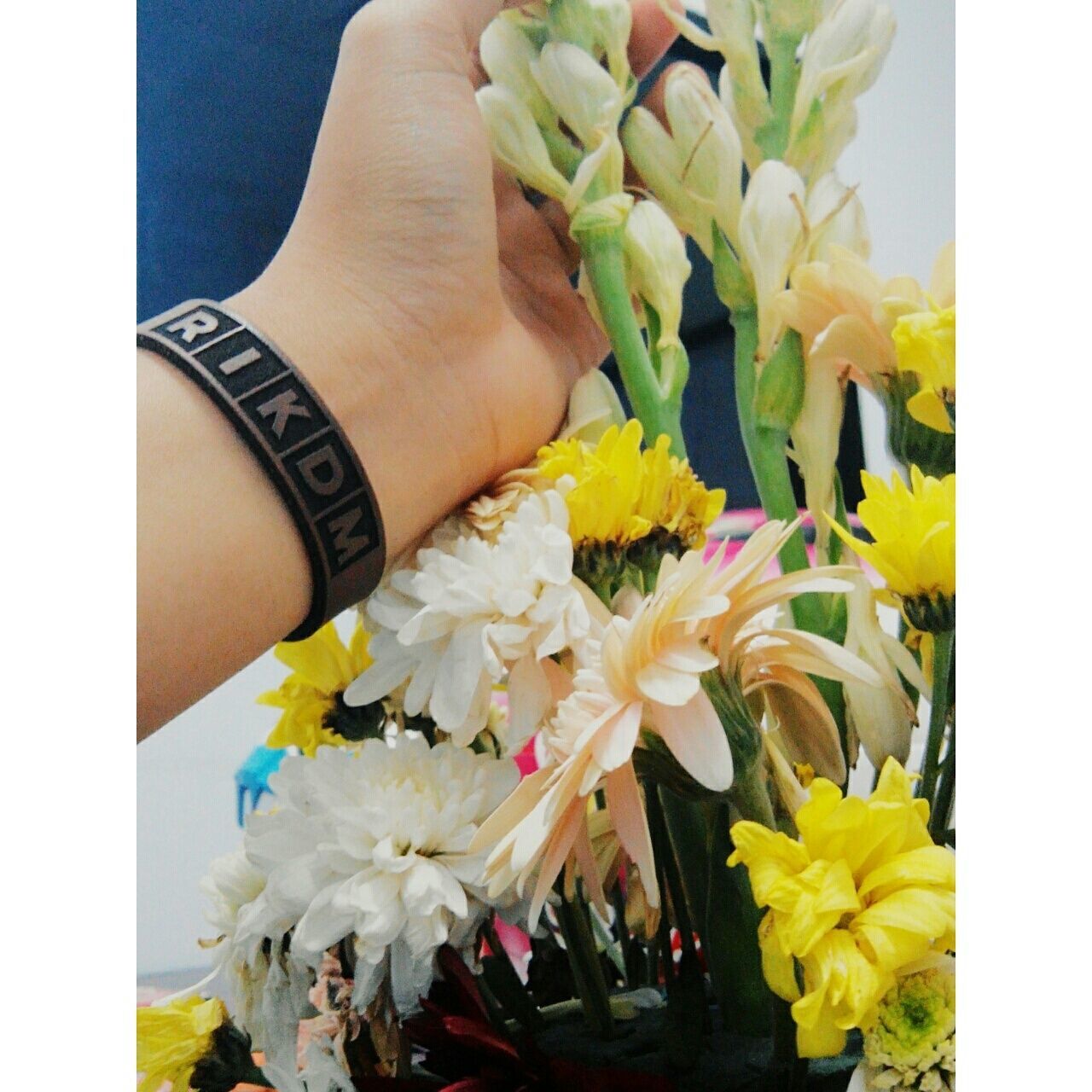 flower, transfer print, freshness, auto post production filter, petal, yellow, fragility, person, flower head, bouquet, holding, indoors, close-up, white color, part of, bunch of flowers