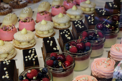 High angle view of various desserts on table