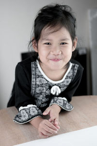 Portrait of smiling young girl