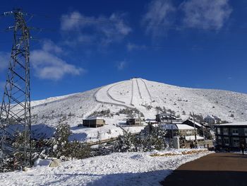 Snow covered mountain against sky