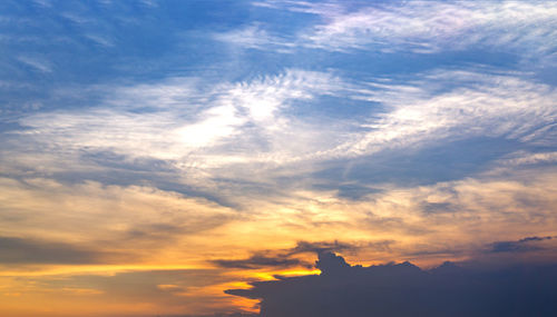 Low angle view of silhouette building against sky during sunset