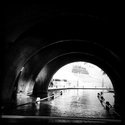 Arch bridge over water