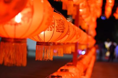 Illuminated lantern hanging in temple