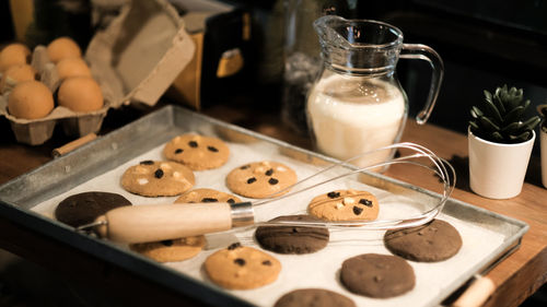 High angle view of cookies in glass on table